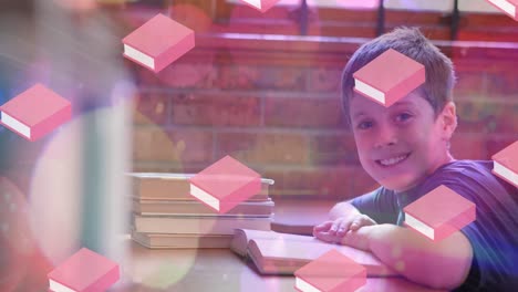 animación de libros que se mueven sobre la lectura de un escolar feliz