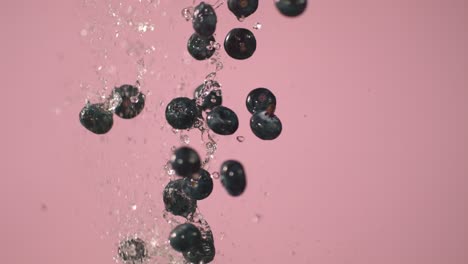 Water-Is-Being-Splashed-Along-With-Blueberries