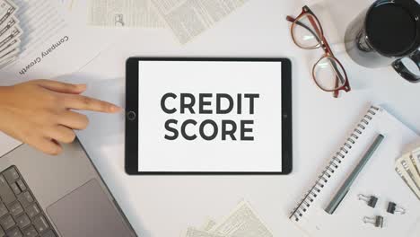 credit score displaying on a tablet screen