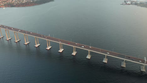 aerial shot over tasman bridge highway at sunset