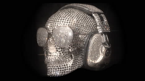 increíble cráneo cubierto de diamantes con auriculares y gafas de sol