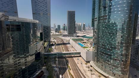 looking from a high-rise building at street traffic along al 'oud street on al reem island, abu dhabi - hyper lapse