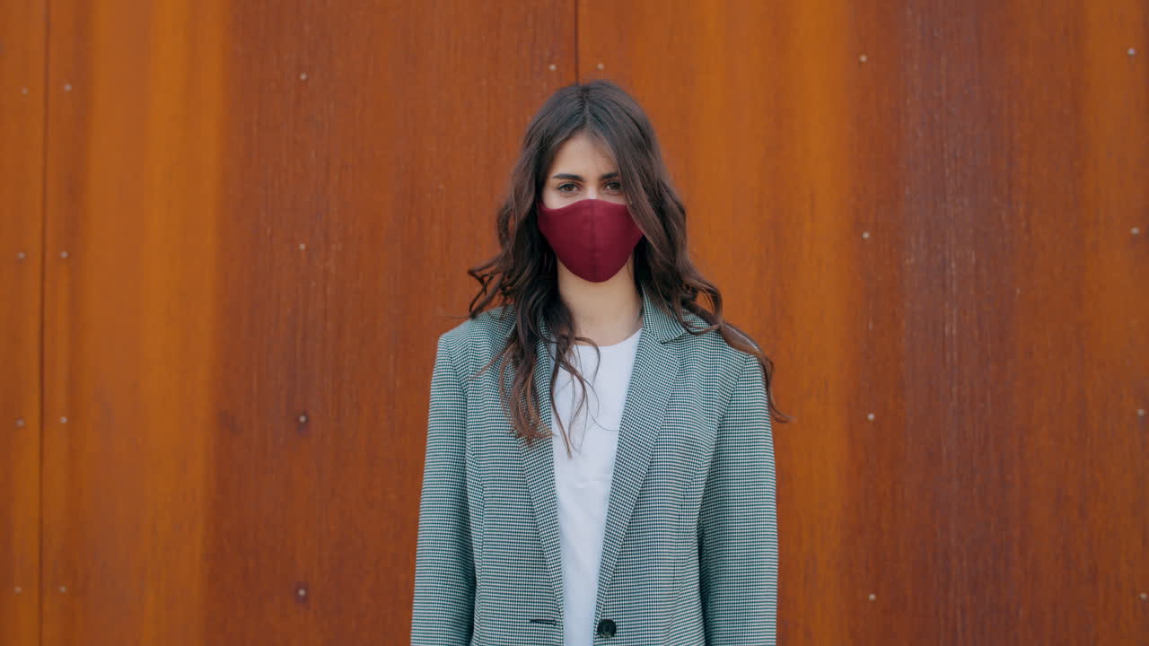 Portrait of a Young Woman Wearing a Face Mask