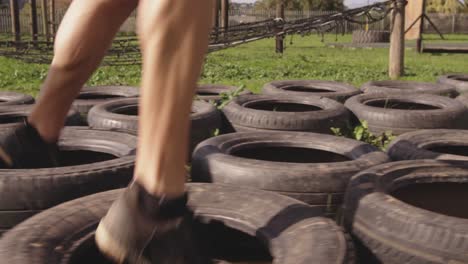 young adults training at an outdoor gym bootcamp