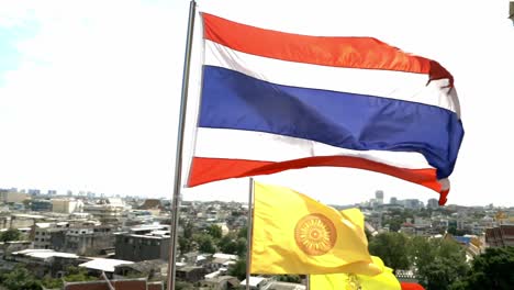 Looking-at-the-flag-of-Thailand-in-the-temple