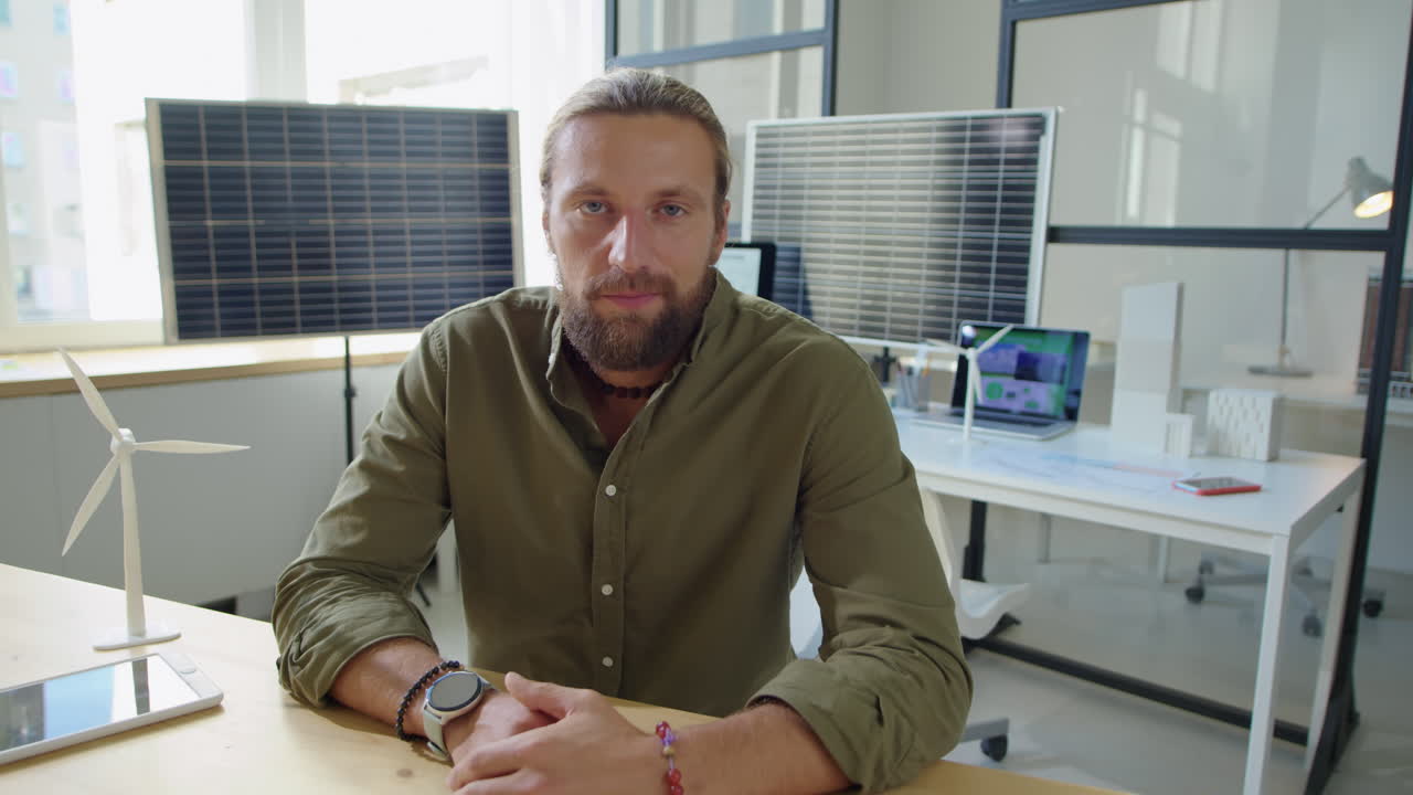 Renewable Energy Engineer Talking on Camera in Office