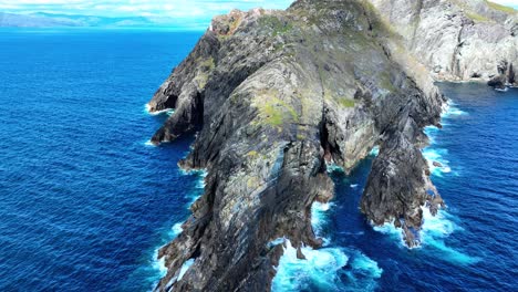 ireland epic locations sheeps head peninsula,wild swell,sea caves,and lighthouses in dramatic landscape