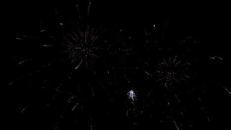 Slowmotion-gimbal-tilting-shot-of-a-beautiful-of-a-firework-show-at-night