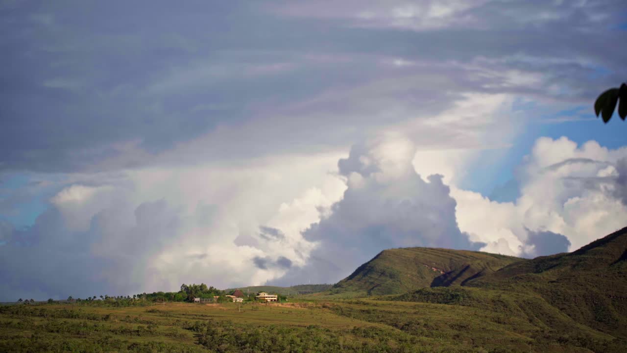 Time lapse of dramatic rainbow and cloudscape forming over Vale Dourado Golden Valley in Alto Paraiso nationa park, Chapada dos Vadeiros, Goias, Goias, Brazil
