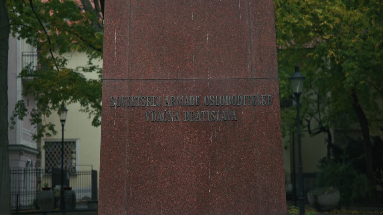 Soviet Liberation Army Memorial inscription on a red granite monument in Bratislava