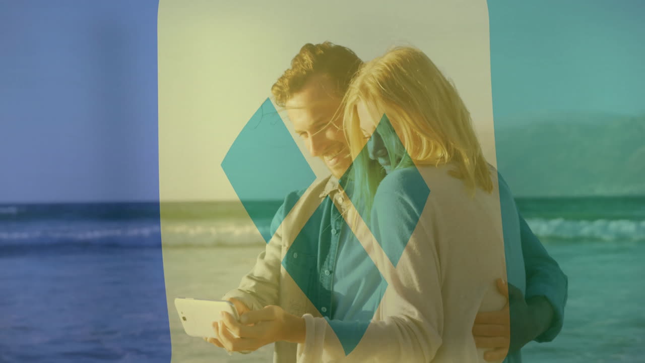 On beach, couple taking selfie with colorful geometric shapes animation overlay