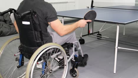 a boy in a wheelchair plays table tennis a boy in a wheelchair plays table tennis disabled sports video
