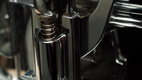 close-up view of a drum pedal mechanism