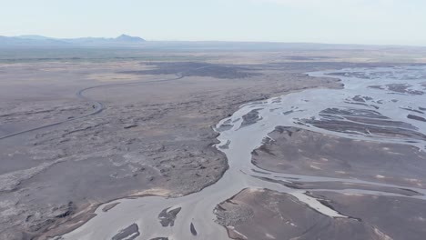 vast river delta landscape in barren land of iceland, aerial