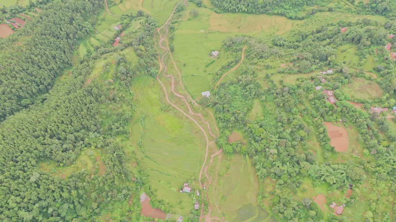 Beautiful hillside view of Tansen Palpa, Nepal, showcasing green mountains, traditional houses, and the peaceful charm of this historic hill town surrounded by nature