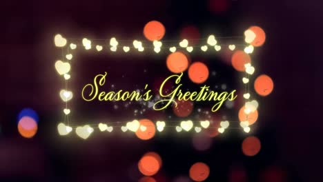 seasons greetings in a glowing frame