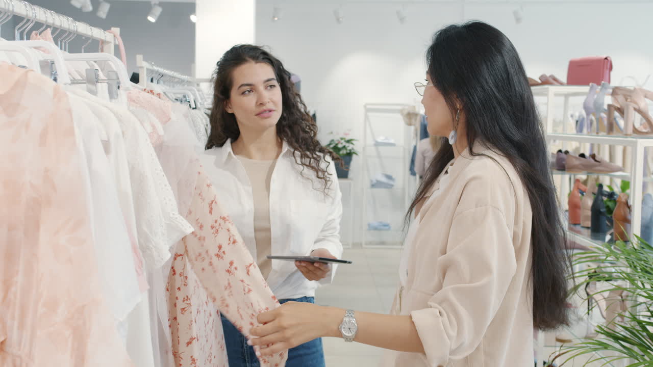 Women Shopping for Clothes in a Fashion Store