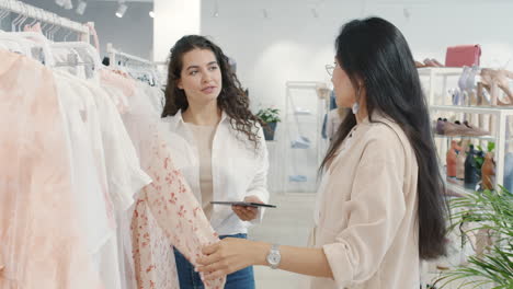 women shopping for clothes in a fashion store