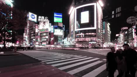 time lapse of shibuya crossing at night. shibuya crossing is one of the busiest crossings in the world.