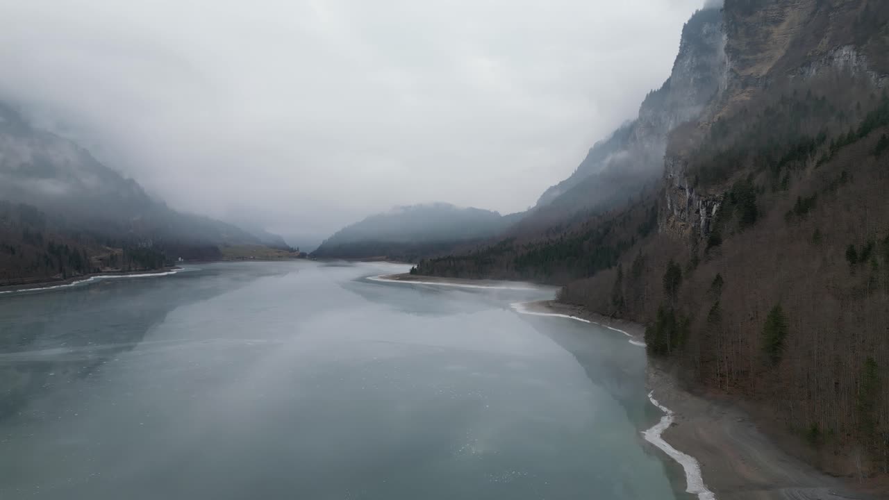 Klöntalersee Glarus Switzerland Perfect view between ice lake and misty