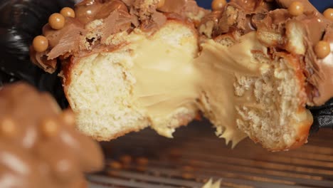 chocolate ferrero donut  being opened