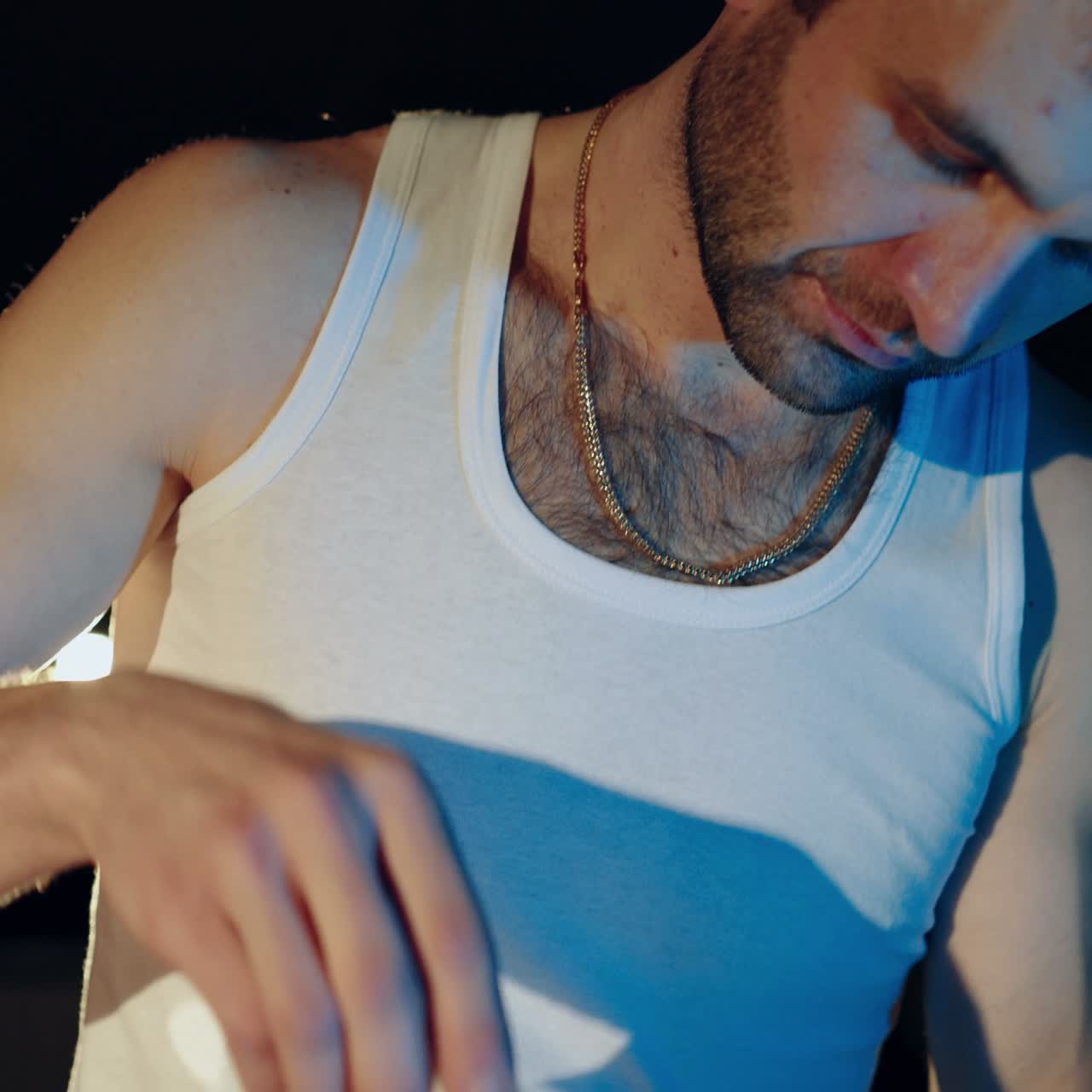 Drug trafficker is packing drugs into suitcase. Close-up. Drug addiction. Criminal Business