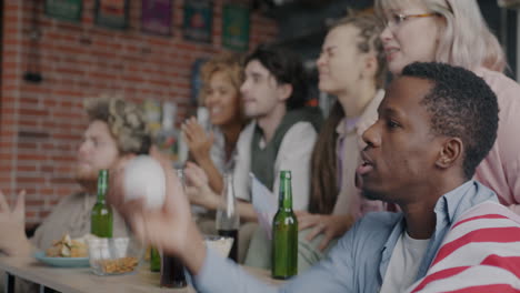 friends watching a game at a restaurant
