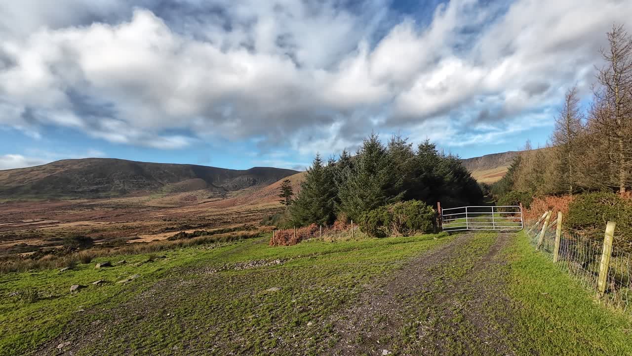 Ireland Mountains trail to the hills dramatic winter sky and clouds Comeragh Mountains Waterford Epic locations and Landscapes