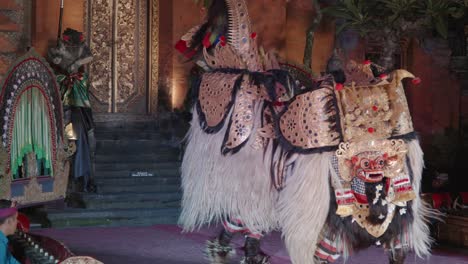 traditional barong mask dance performance at ubud palace bali, indonesia - slow motion