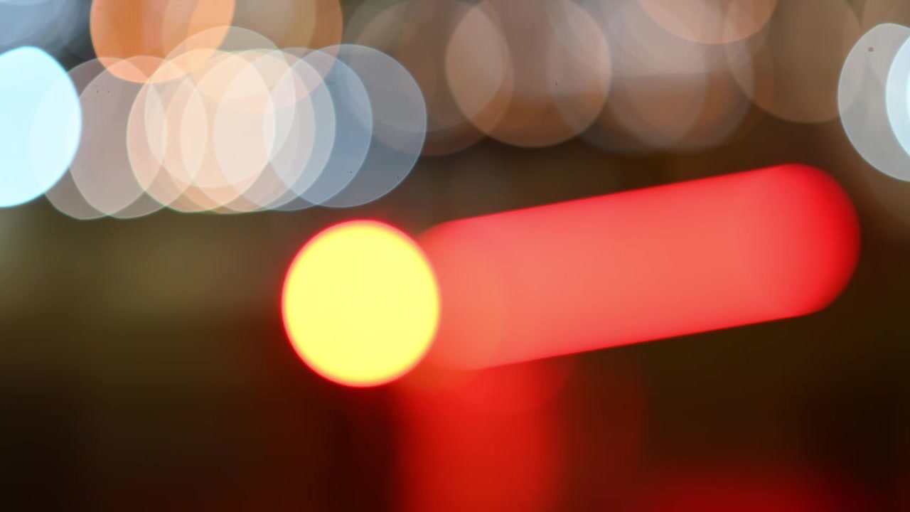 Luces bokeh dinámicas con efecto de parpadeo rojo y amarillo