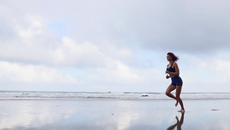captivating morning jog by the ocean: sculpting the body's graceful curves in slow motion