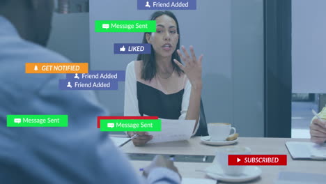 animation of notification bars over diverse woman sharing ideas with coworkers in office