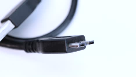 macro shot of ssd hard disk wire plug connector, close up view in 4k over white background