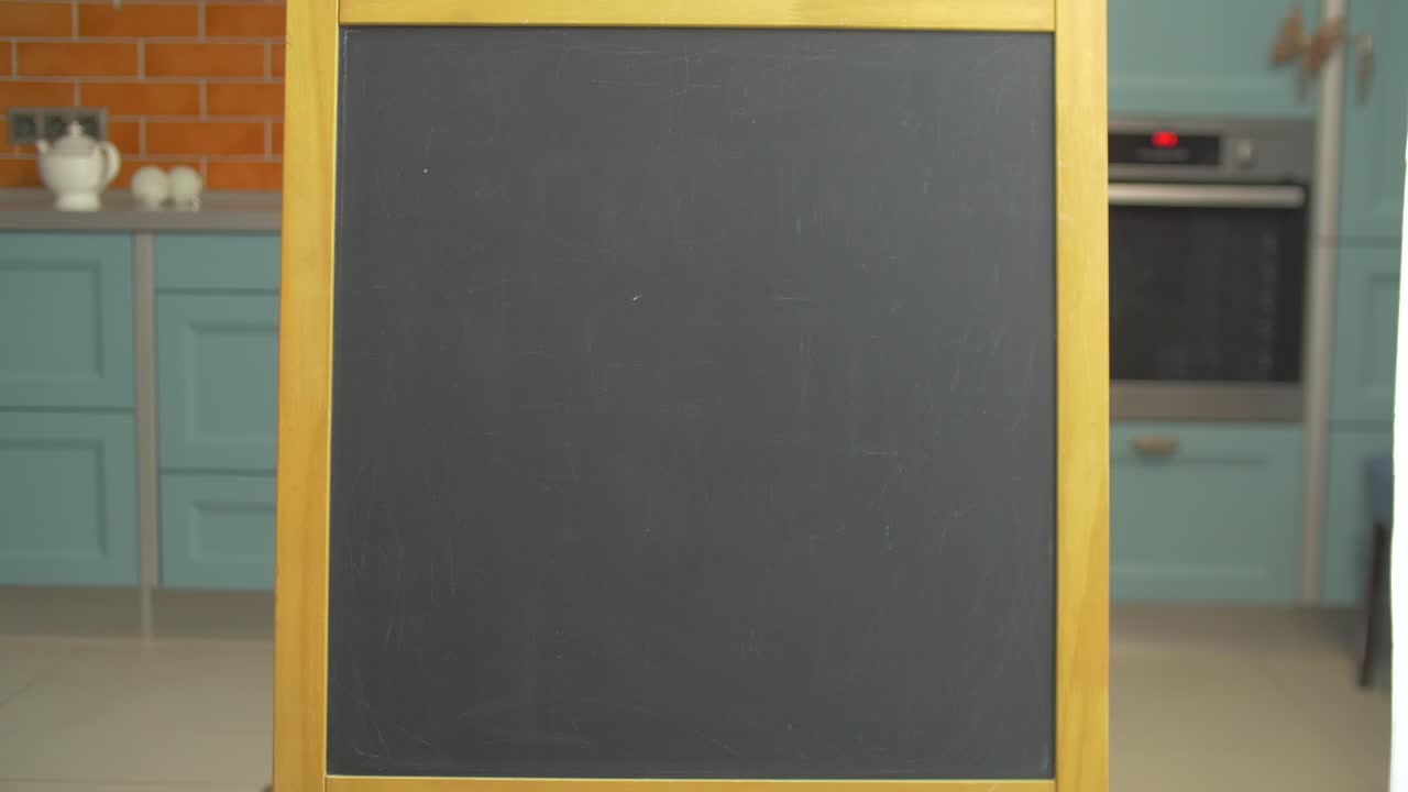 Empty Chalkboard in a Kitchen