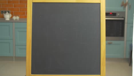 empty chalkboard in a kitchen