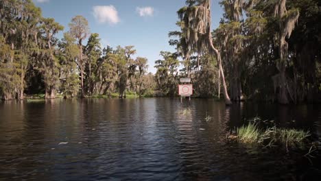 4k cinematic drone video over the middle of lake minnehaha in clermont, fl