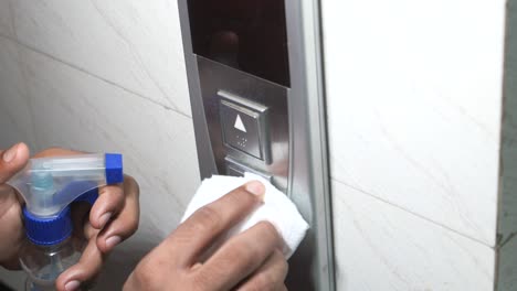 cleaning an elevator control panel