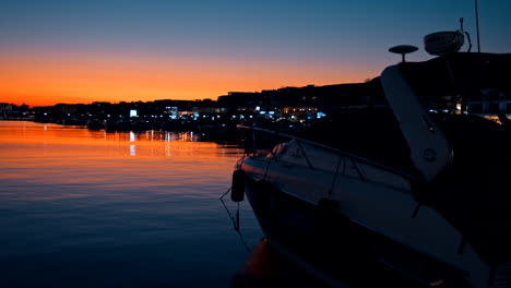 yachts on the pier at sunset