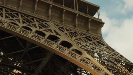 handheld pan tracking detail shot of the eiffel tower tour eiffel in paris, france, europe