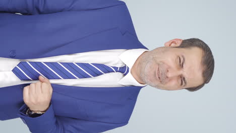 Vertical-video-of-Sneezing-businessman.