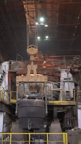 industrial steel production facility with molten metal ladle