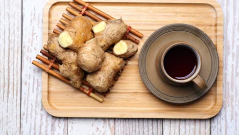 ginger tea on wooden background