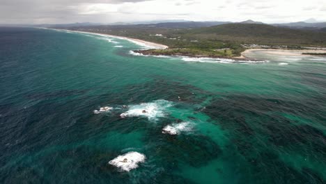 turquoise seascape at hastings point in new south wales, australia - aerial shot