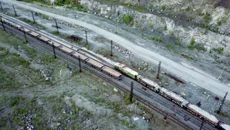 quarry with train and cargo cars