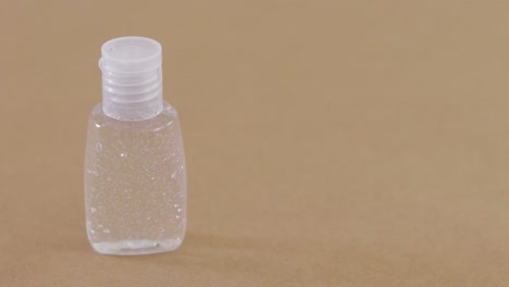 anticabterial gel bottled in plastic bottle. left side