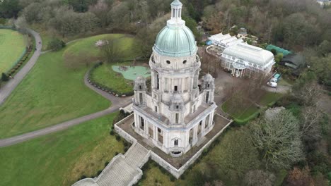 aerial view landmark historical copper dome building ashton memorial english countryside descending tilt up