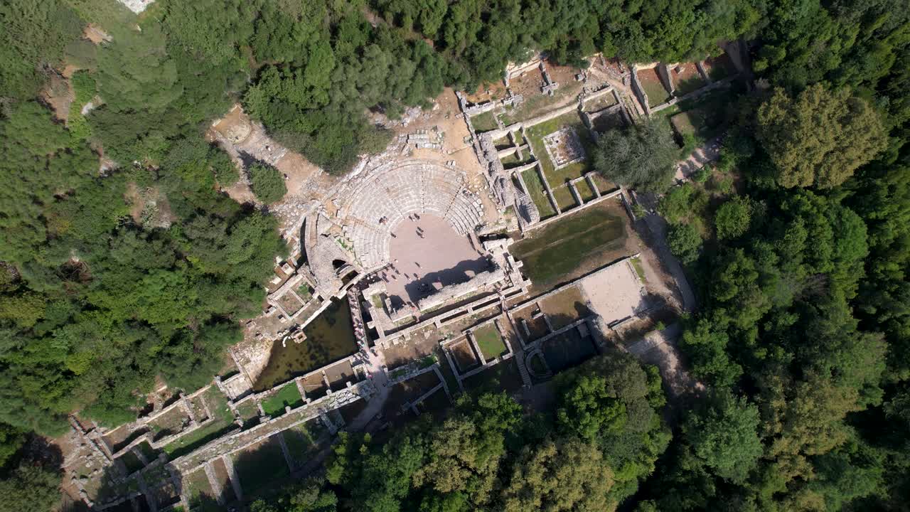 Butrint Ancient Roman Amphitheater, Gladiators' Abode, and Ruined Stone Walls &ndash; A Glimpse into Roman History Visited by Tourists in Albania