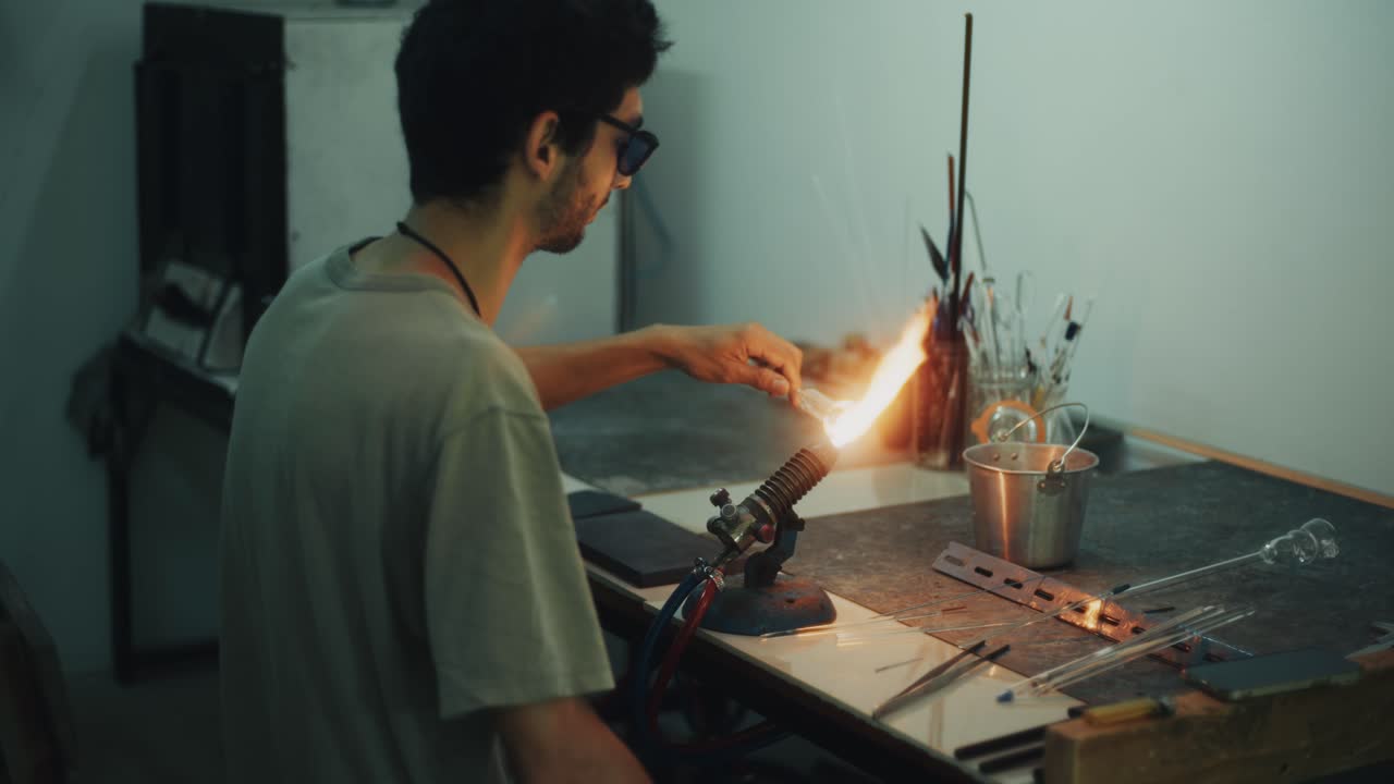 Glassblowing Artistry: A Craftsperson at Work