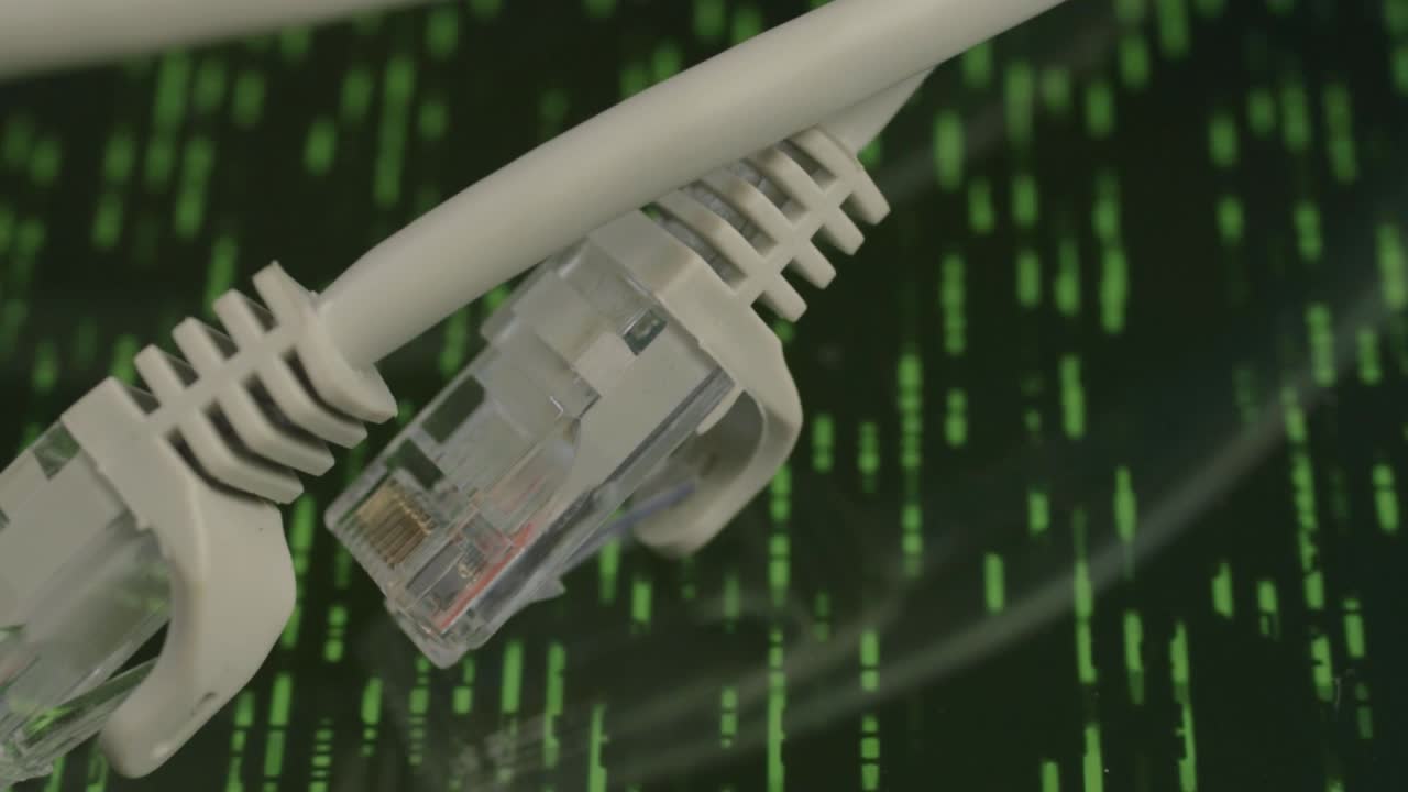 Ethernet network cables with data storm running on a screen