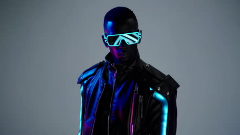 man in futuristic cyberpunk outfit with neon lights